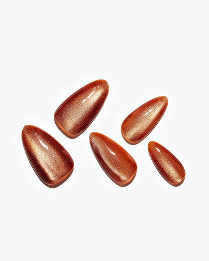 KOSBLING nail studio — Cat Eye / Caramel Swirl