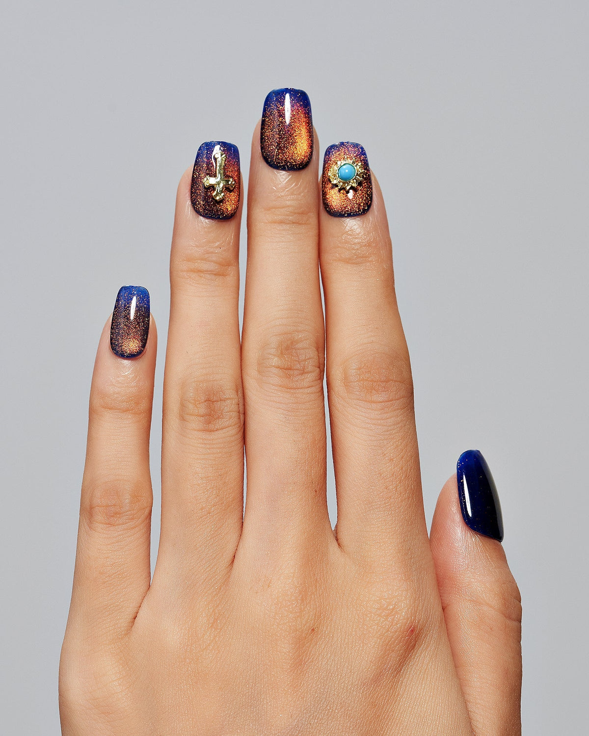 KOSBLING nail studio — Cat Eye / Sapphire Spice
